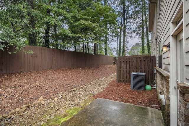 2294 Spicy Pine Ln, Lawrenceville, GA 30044 - fenced backyard featuring central air condition unit and a patio