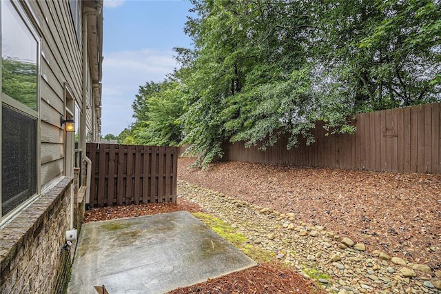 2294 Spicy Pine Ln, Lawrenceville, GA 30044 - fenced backyard with a patio