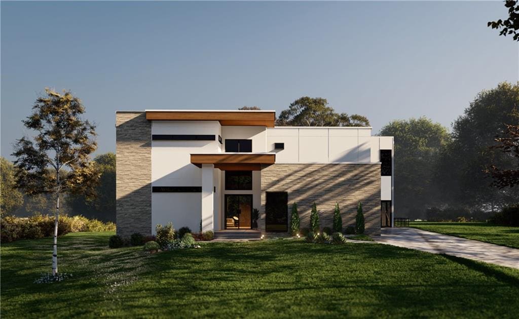 contemporary house featuring a front lawn