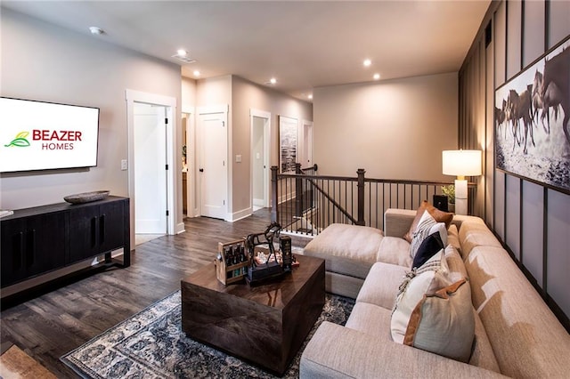 living room featuring dark wood-type flooring