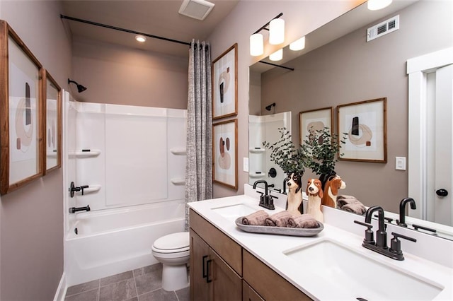 full bathroom featuring vanity, tile patterned flooring, shower / tub combo, and toilet