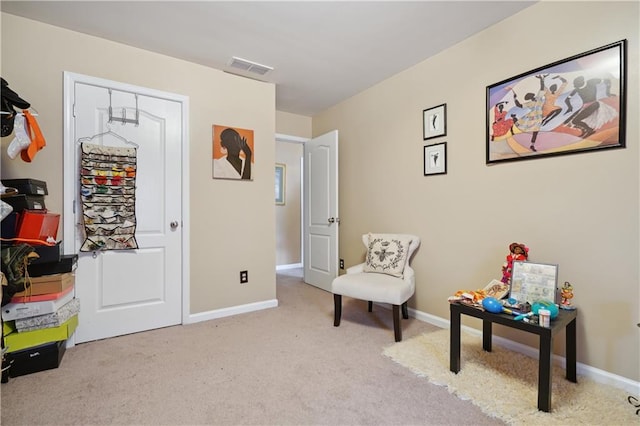 sitting room with light carpet