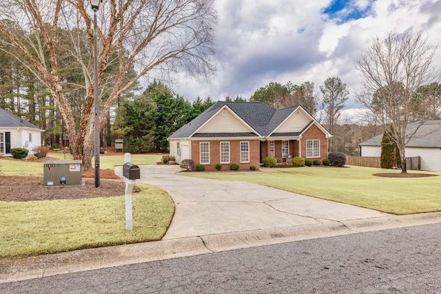 single story home featuring a front lawn