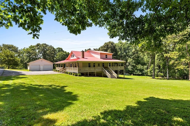 46 Loving Meadows Ln, Morganton, GA 30560 - view of grassy yard featuring stairs, an outdoor structure, a garage, and a porch