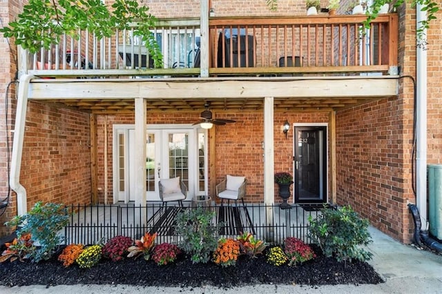 property entrance featuring cooling unit and a balcony