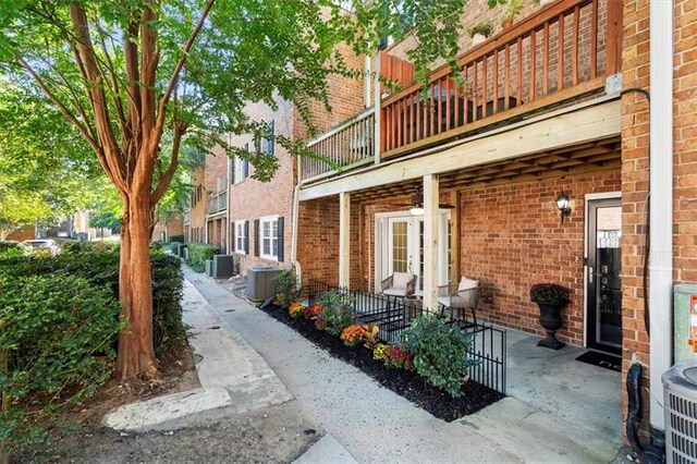 exterior space featuring a balcony and central air condition unit