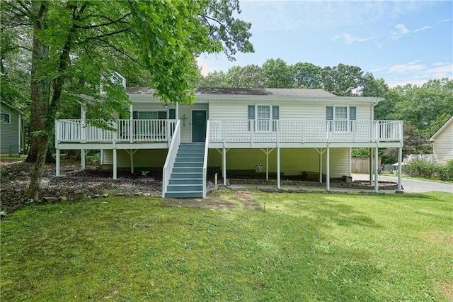 6223 Emerald Springs Dr SE, Acworth, GA 30102 - rear view of house with a deck, a lawn, and stairway