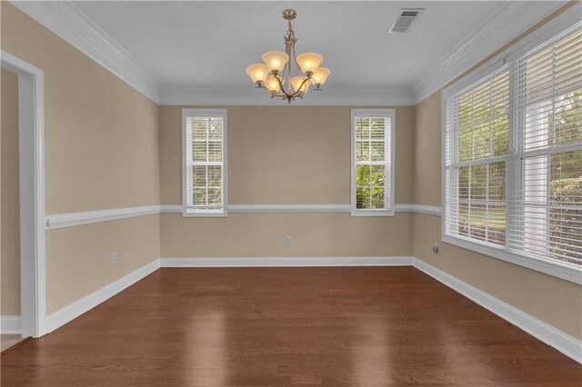 102 Plantation Dr, Lagrange, GA 30277 - empty room featuring a chandelier, dark wood finished floors, and crown molding