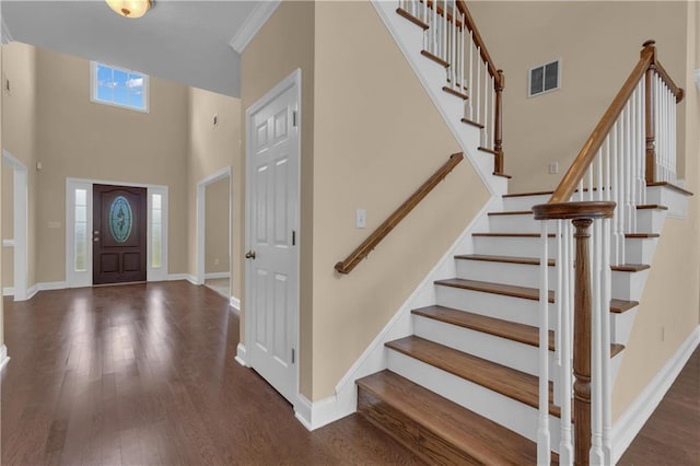 102 Plantation Dr, Lagrange, GA 30277 - foyer with stairs, wood finished floors, and a high ceiling