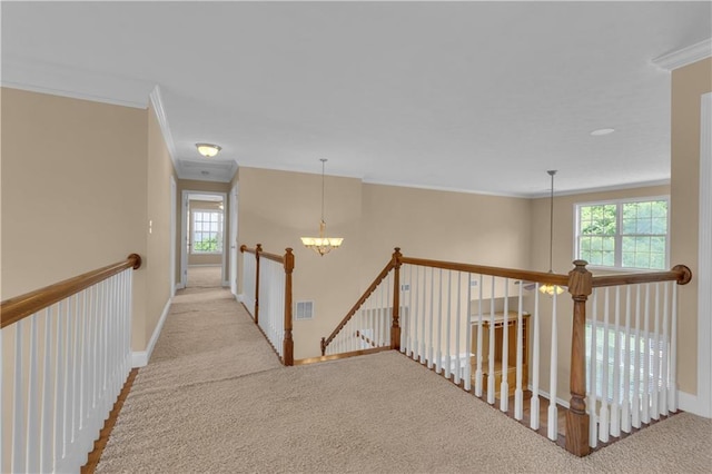 102 Plantation Dr, Lagrange, GA 30277 - corridor with crown molding, carpet, a chandelier, and an upstairs landing