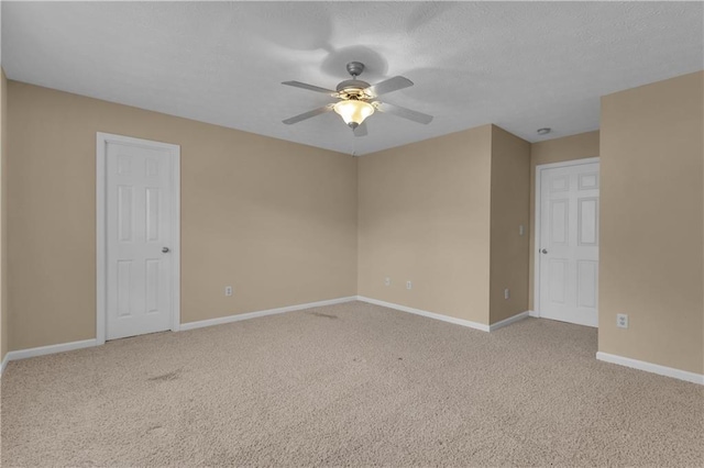 102 Plantation Dr, Lagrange, GA 30277 - spare room with ceiling fan, carpet floors, and a textured ceiling