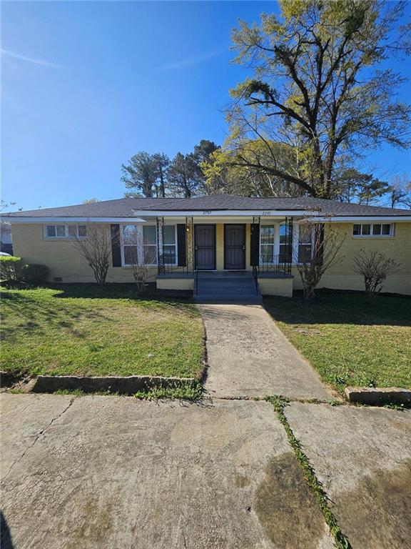 2795 Tilson Rd, Decatur, GA 30032 - single story home with a front lawn and a porch