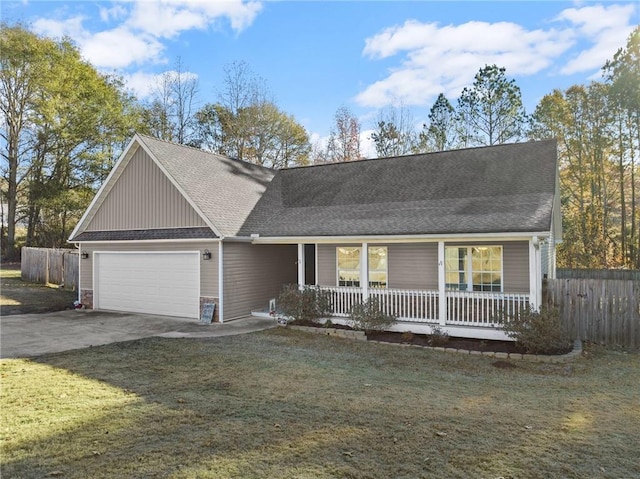 ranch-style home with a porch, a front yard, and a garage