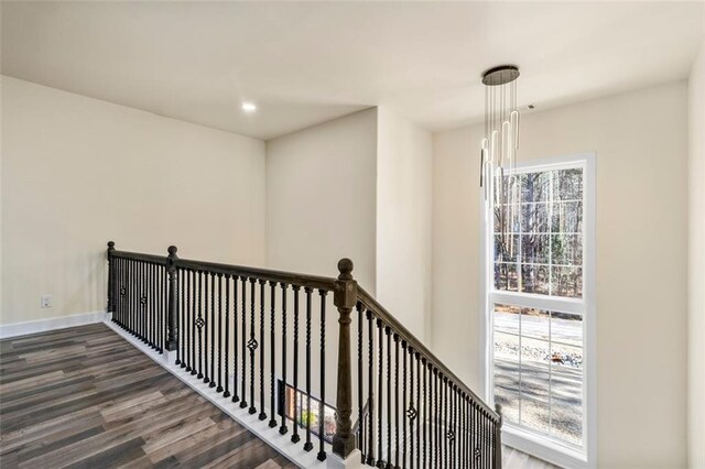 hall with dark wood-type flooring