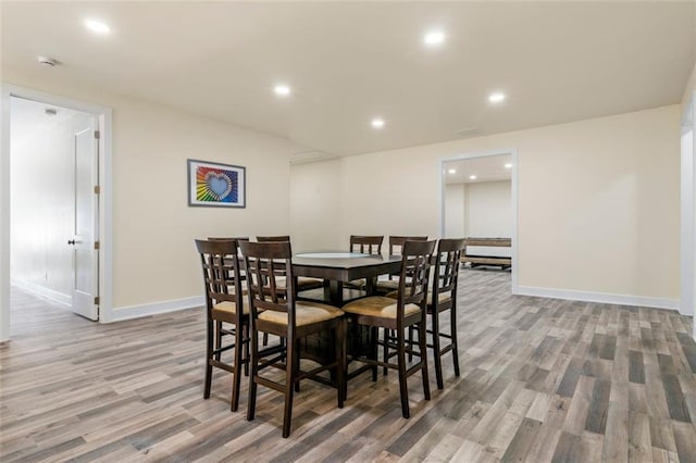 dining room with light hardwood / wood-style flooring