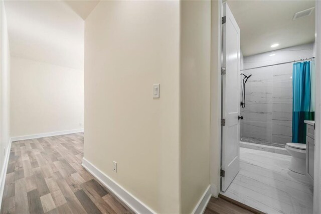 hallway featuring light wood-type flooring