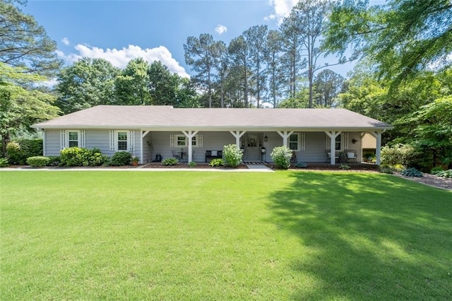 ranch-style house with a front yard and a porch