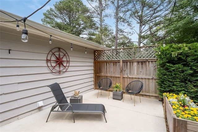 view of patio / terrace with fence