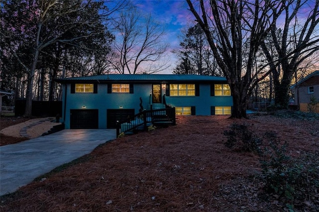 bi-level home featuring a garage