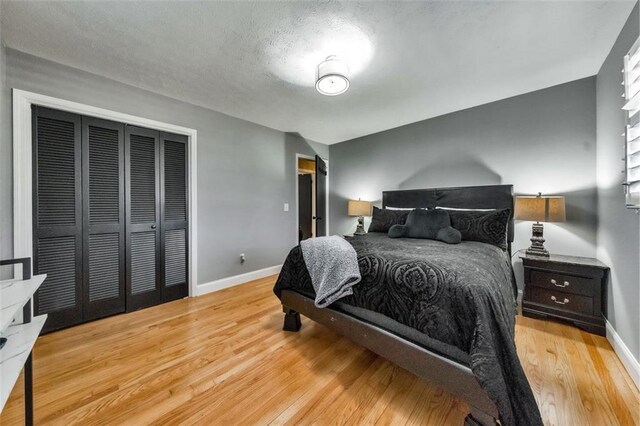 bedroom with light hardwood / wood-style floors