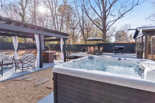 view of patio / terrace featuring a hot tub