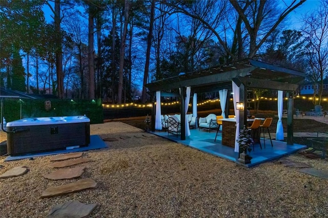 view of patio featuring a hot tub