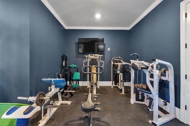 exercise area featuring crown molding