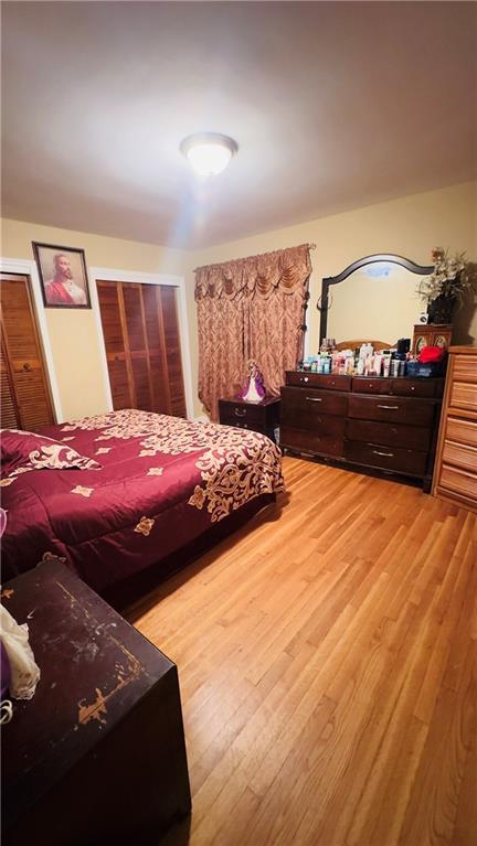 bedroom featuring hardwood / wood-style floors