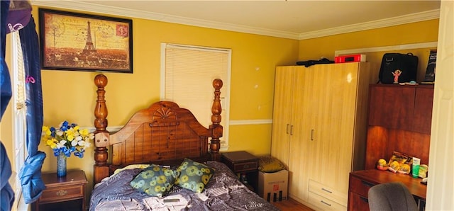 bedroom with crown molding