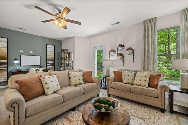 living room with ceiling fan