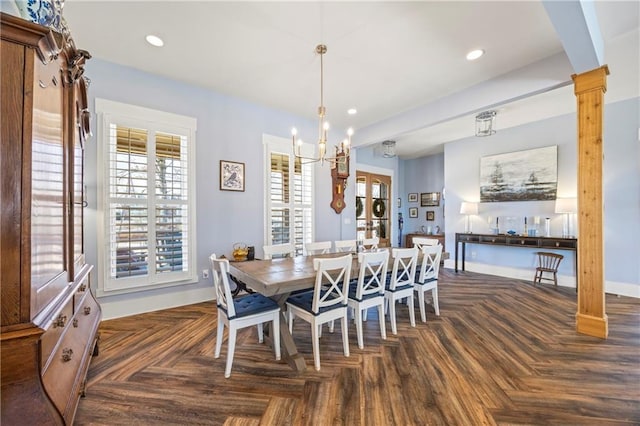 4115 Merritt Dr, Cumming, GA 30041 - dining area featuring dark parquet flooring, a chandelier, and decorative columns
