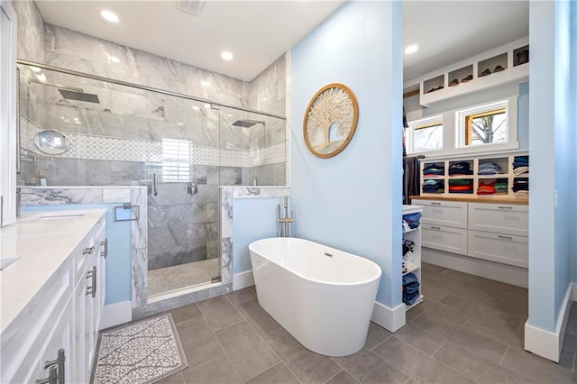 4115 Merritt Dr, Cumming, GA 30041 - bathroom with a healthy amount of sunlight, vanity, and shower with separate bathtub