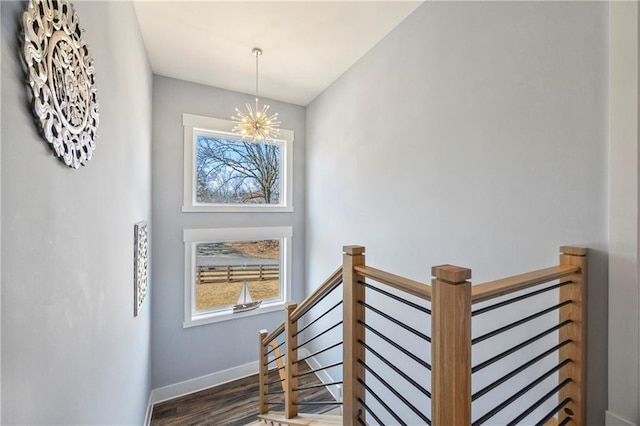 4115 Merritt Dr, Cumming, GA 30041 - stairs featuring hardwood / wood-style flooring and an inviting chandelier