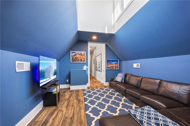 4115 Merritt Dr, Cumming, GA 30041 - living room featuring lofted ceiling and hardwood / wood-style floors