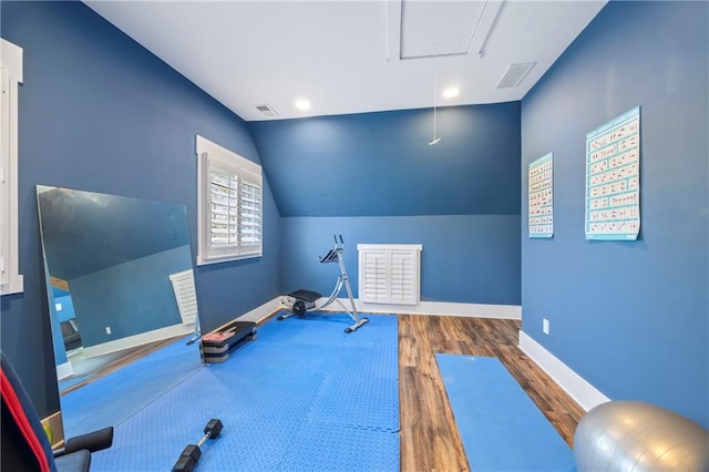 4115 Merritt Dr, Cumming, GA 30041 - exercise room featuring lofted ceiling and dark hardwood / wood-style flooring