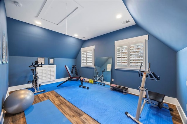 4115 Merritt Dr, Cumming, GA 30041 - exercise room with lofted ceiling and hardwood / wood-style flooring