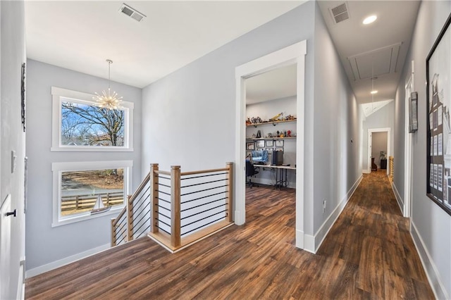 4115 Merritt Dr, Cumming, GA 30041 - hall with dark hardwood / wood-style flooring and a notable chandelier