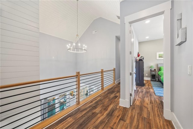 4115 Merritt Dr, Cumming, GA 30041 - corridor featuring dark hardwood / wood-style floors, a chandelier, and vaulted ceiling