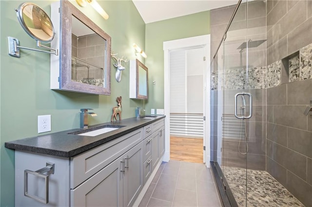 4115 Merritt Dr, Cumming, GA 30041 - bathroom with vanity, an enclosed shower, and tile patterned flooring