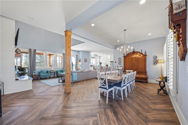 4115 Merritt Dr, Cumming, GA 30041 - dining area featuring an inviting chandelier, dark parquet flooring, beam ceiling, and decorative columns