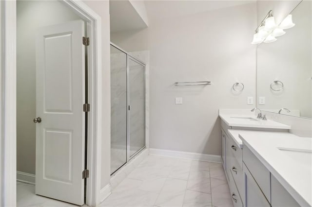 bathroom with vanity and an enclosed shower