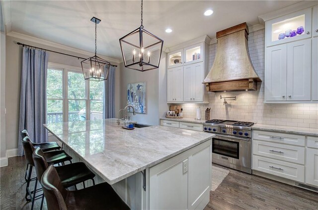 16 Cambridge Way, Cartersville, GA 30121 - kitchen with stainless steel range, premium range hood, a chandelier, recessed lighting, and dark wood-type flooring