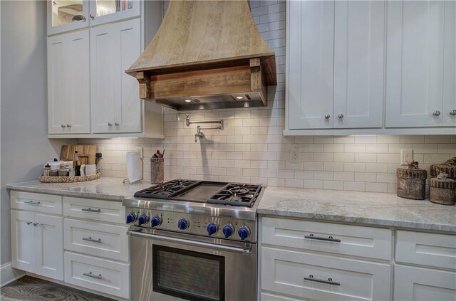 16 Cambridge Way, Cartersville, GA 30121 - kitchen featuring custom exhaust hood, high end stainless steel range, and white cabinets