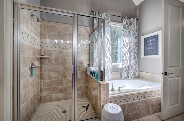 16 Cambridge Way, Cartersville, GA 30121 - bathroom with a garden tub, a stall shower, and tile patterned flooring