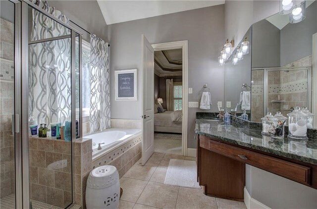 16 Cambridge Way, Cartersville, GA 30121 - ensuite bathroom with tile patterned flooring, a bath, vanity, and a stall shower