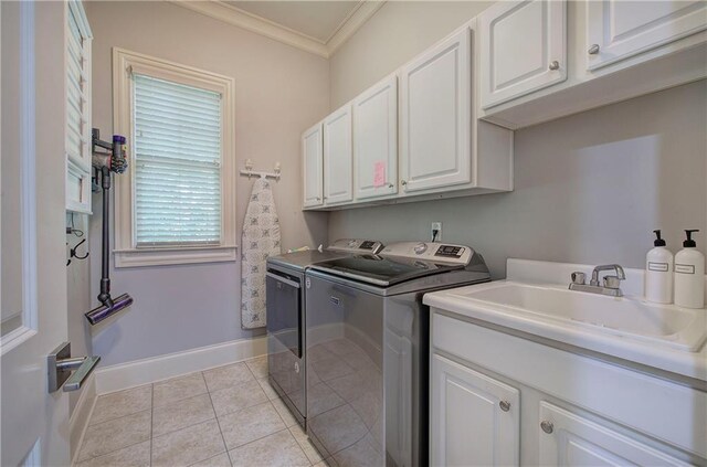 16 Cambridge Way, Cartersville, GA 30121 - laundry area with cabinet space, washing machine and clothes dryer, crown molding, and light tile patterned flooring