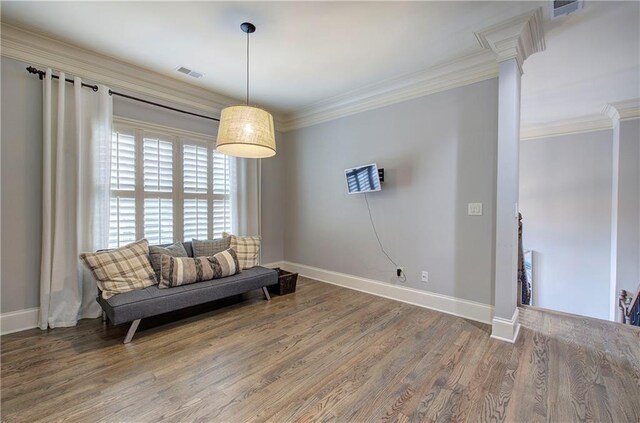 16 Cambridge Way, Cartersville, GA 30121 - living area featuring crown molding, wood finished floors, and decorative columns