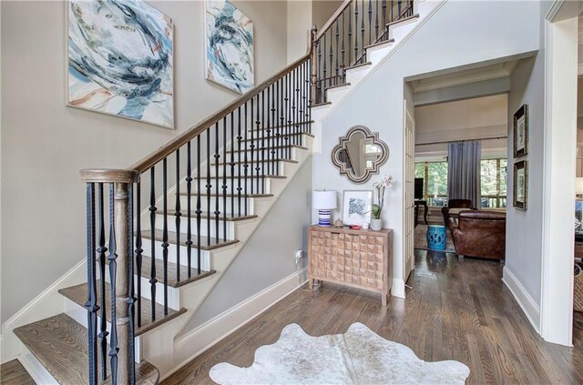 16 Cambridge Way, Cartersville, GA 30121 - stairs featuring wood finished floors and baseboards