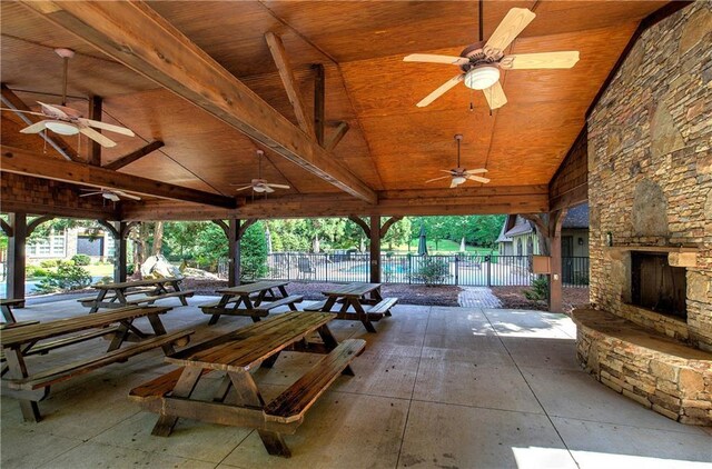 16 Cambridge Way, Cartersville, GA 30121 - view of patio / terrace with a ceiling fan and an outdoor stone fireplace