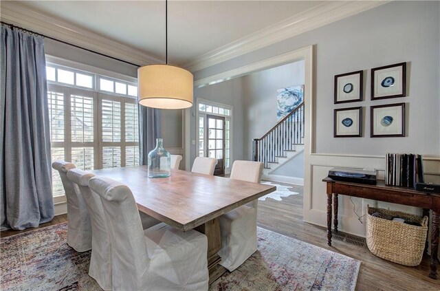 16 Cambridge Way, Cartersville, GA 30121 - dining room with crown molding, wood finished floors, and stairway